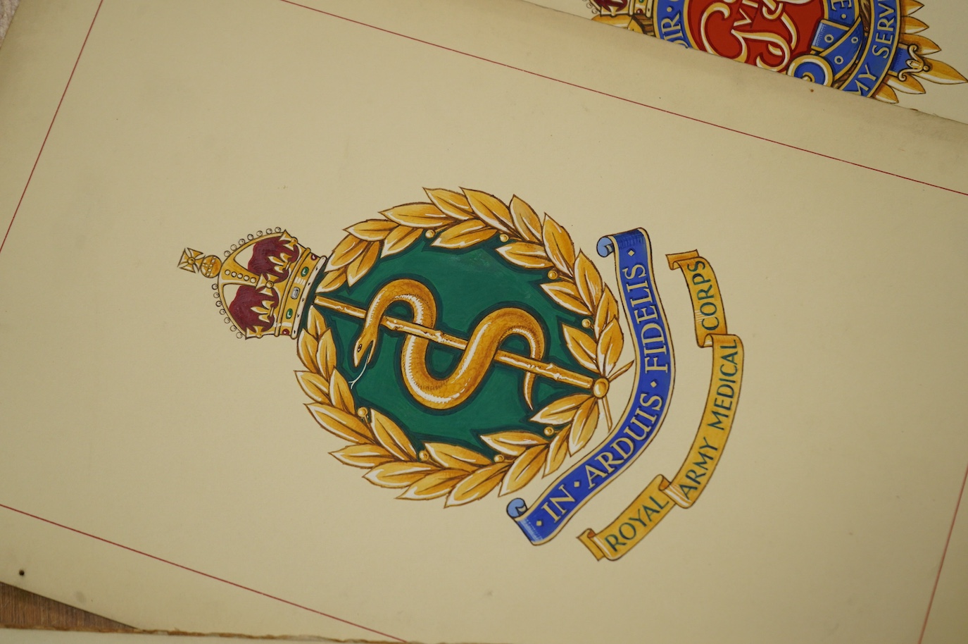 A set of five original WWII watercolours for postcard designs, Badges of the Services to include ‘Royal Artillery’, ‘Royal Engineers’ and ‘’Royal Army Medical Corps’, unsigned, unframed, 18 x 29cm. Condition - fair